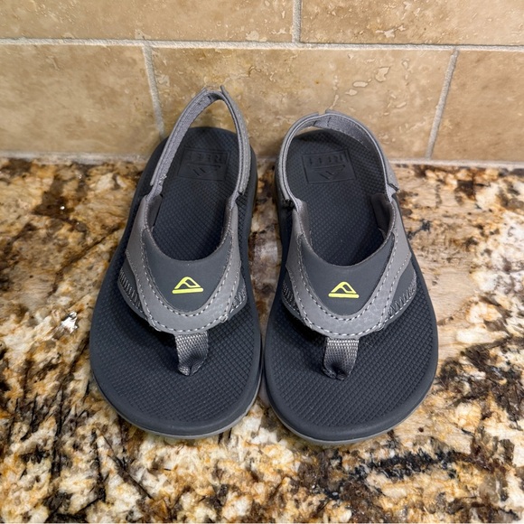 Reef Gray and Black Sandals with Yellow Accent - Picture 1 of 4
